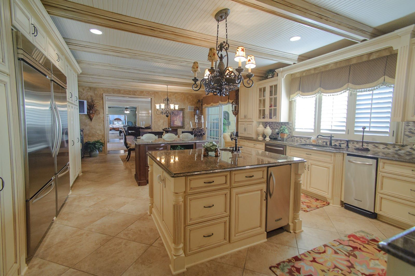 A spotless, photo-ready kitchen with cleared countertops, everything staged before the photographer arrived